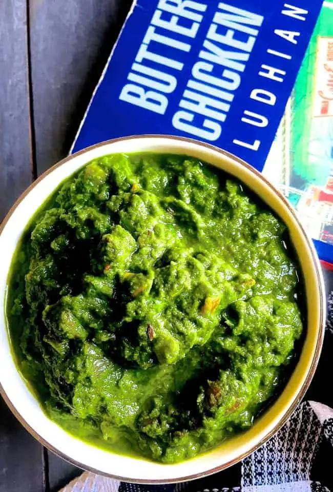 A bowl of mustard greens the traditional sarson ka saag, cooked in onions and tomatoes