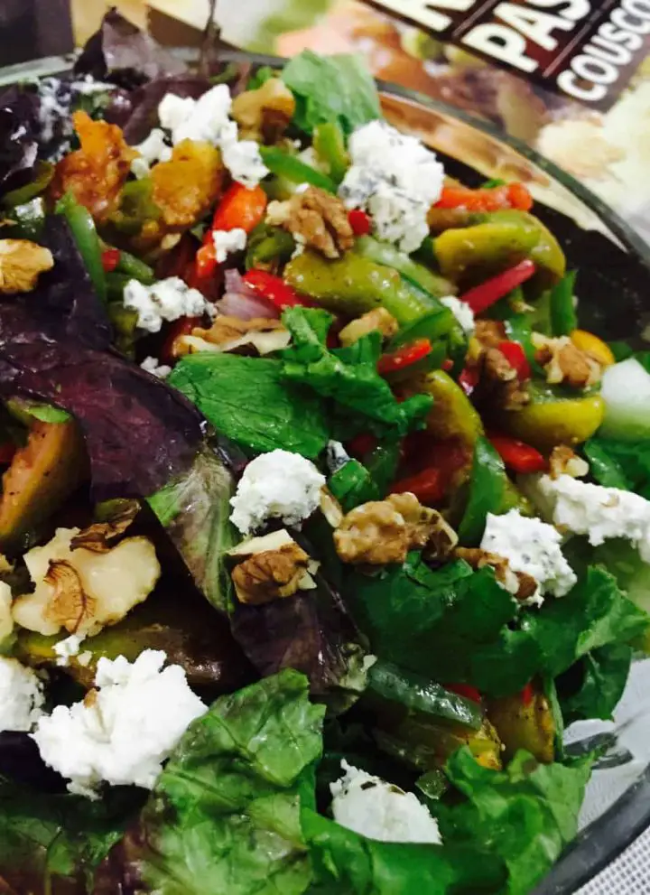 Salad of roasted figs, greens, walnuts, tomatoes and goats cheese