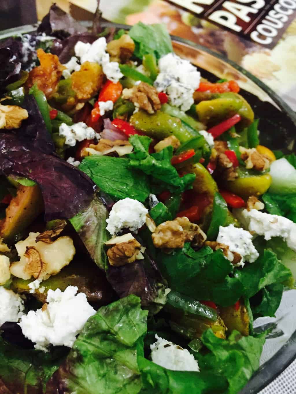 Salad of roasted figs, greens, walnuts, tomatoes and goats cheese