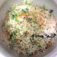 Add the rice for the Tehri_PepperOnPizza.com