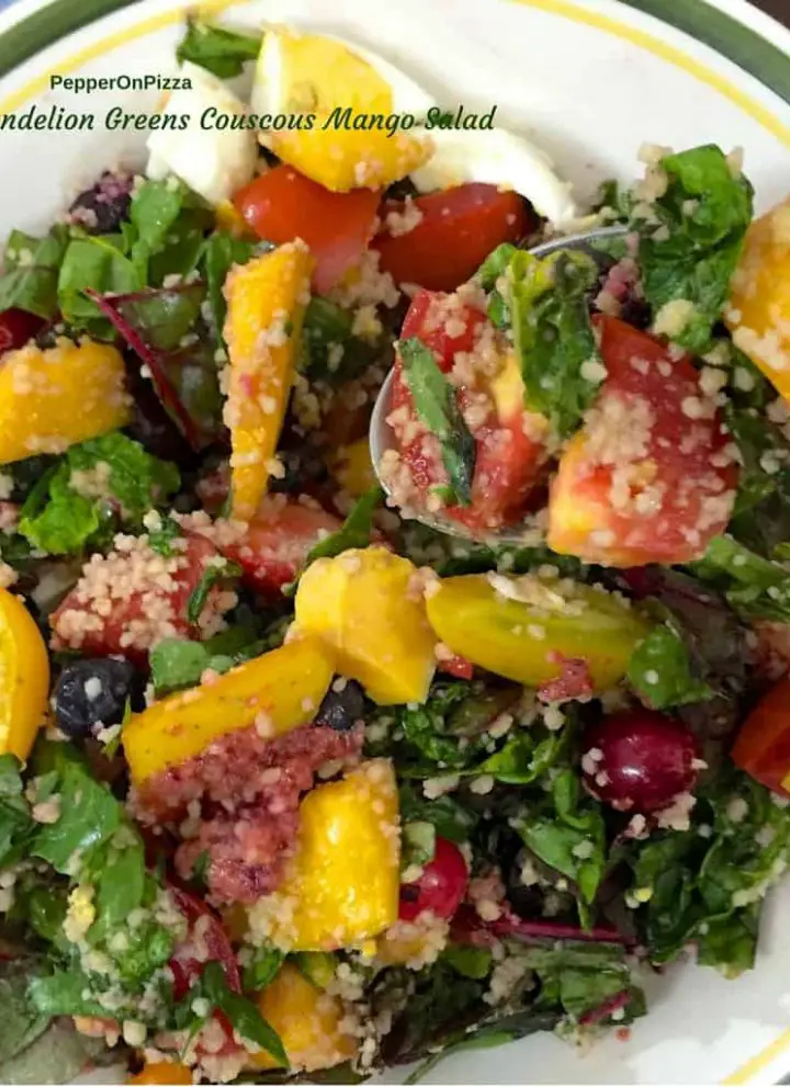 Dandelion greens with Couscous and Mango salad