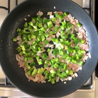 Green Shakshuka Process shot 1_ Sauté onion, add capsicum