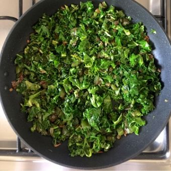 Green Shakshuka Process Shot 3: Cook the kale till it begins to wilt