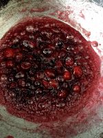 Cook the cranberries and maple syrup on low flame
