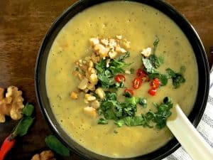 Easy and flavourful curried chilli zucchini soup with herbs and a touch of fresh chilli with turmeric and walnuts to add extra health and nutrition.