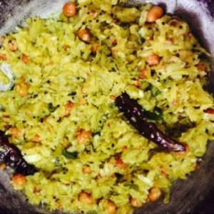 Process: Adding grated raw mango to the tempering