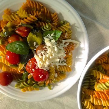 Easy quick Rotini Pasta in Garlicky Burst Cherry Tomato Sauce made from colourful, juicy cherry tomatoes, garlic, fresh basil and spirally wholewheat pasta