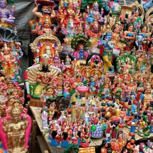 Colourful paper mache and clay dolls of Hindu Gods and other decorative items for Navaratri Golu in Chennai, India