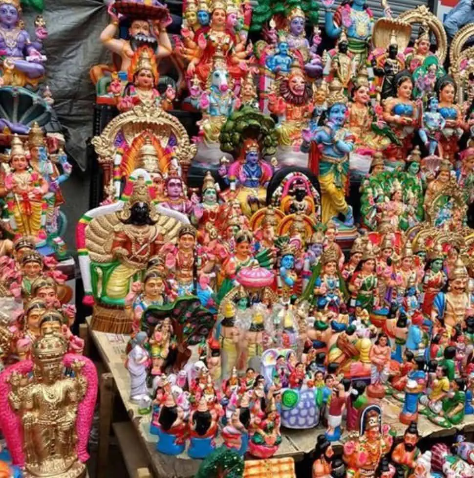 Colourful paper mache and clay dolls of Hindu Gods and other decorative items for Navaratri Golu in Chennai, India
