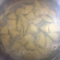 Potato cubes added to boiling water as the first step for Oying Vegetable Stew from Arunachal Pradesh in N E India