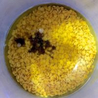 Pressure cook dal with jaggery and turmeric