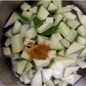 1. Cook mango turmeric salt in water 