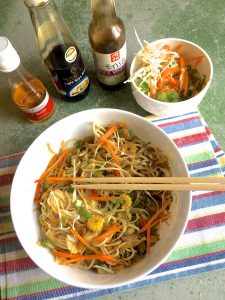 Stir fried vegetable noodles with ginger, soy sauce, miso paste and rice vinegar