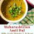 Panchmel or 5 lentil Maharashtrian Amti Dal in a wide bowl, garnished with cilantro, a green checked napkin on one side and a book on Bombay alongside.