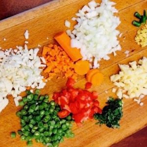 Slice the vegetables for Upma