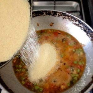Add rava in a slow flow and stir while adding