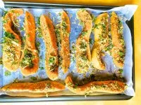 Arrange the herb and parmesan crusted squash on a baking tray